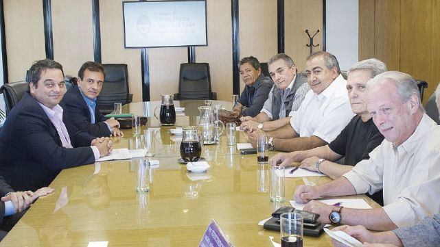 Triaca reunido con la CGT