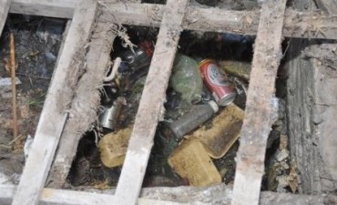 Barrio Lubo: limpian bocas de tormenta tapadas de basura
